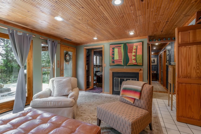 7901 N Chesley Dr, Columbia, MO 65202 - living area with recessed lighting, wood ceiling, light tile patterned floors, and a glass covered fireplace