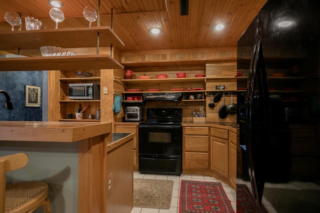 7901 N Chesley Dr, Columbia, MO 65202 - kitchen with black appliances, open shelves, ventilation hood, wood ceiling, and light tile patterned floors