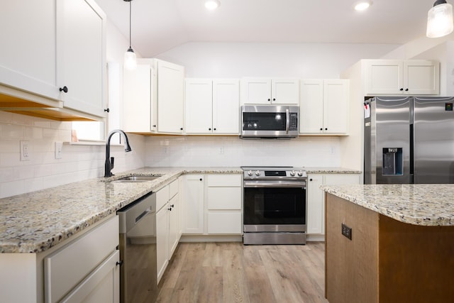 16110 Blue Heron Dr, Ashland, MO 65010 - kitchen with stainless steel appliances, a sink, light wood-type flooring, white cabinets, and lofted ceiling