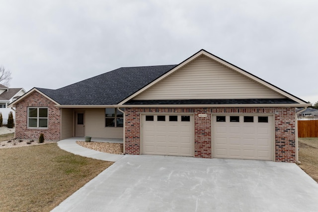 16110 Blue Heron Dr, Ashland, MO 65010 - ranch-style home with driveway, an attached garage, brick siding, a shingled roof, and a front yard