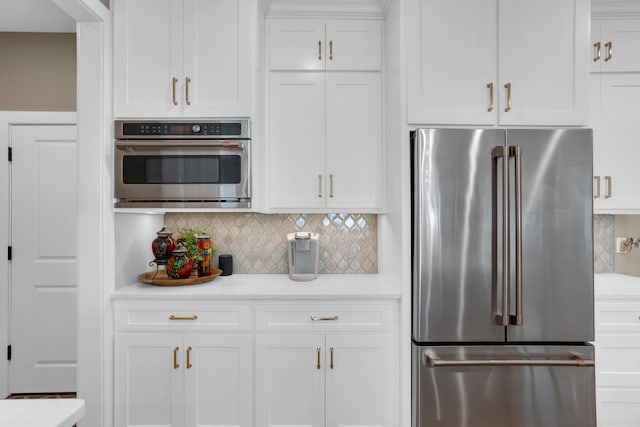 7501 Kirby Knowle Ct, Columbia, MO 65203 - kitchen featuring high end refrigerator, tasteful backsplash, light countertops, and white cabinets