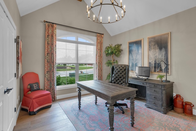 7501 Kirby Knowle Ct, Columbia, MO 65203 - office area featuring a chandelier, wood finished floors, and high vaulted ceiling