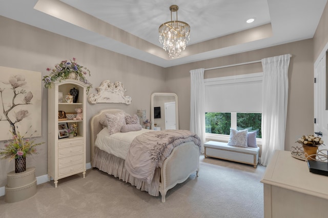 7501 Kirby Knowle Ct, Columbia, MO 65203 - bedroom with light carpet, a raised ceiling, and a chandelier