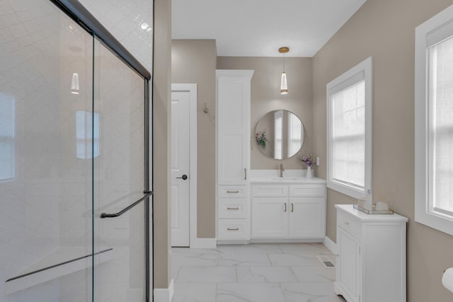 7501 Kirby Knowle Ct, Columbia, MO 65203 - full bathroom featuring a stall shower, vanity, and marble look tile flooring