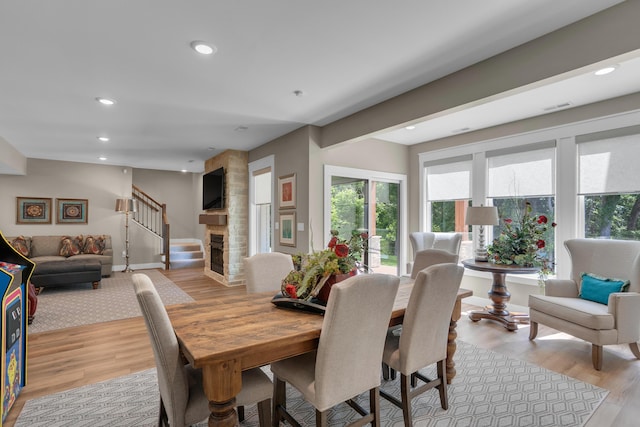 7501 Kirby Knowle Ct, Columbia, MO 65203 - dining space with plenty of natural light, light wood finished floors, recessed lighting, and stairs