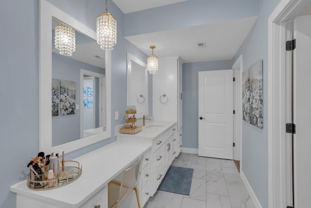 7501 Kirby Knowle Ct, Columbia, MO 65203 - full bath featuring marble look tile flooring, double vanity, and a chandelier