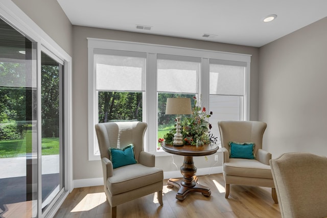 7501 Kirby Knowle Ct, Columbia, MO 65203 - sitting room with wood finished floors and recessed lighting