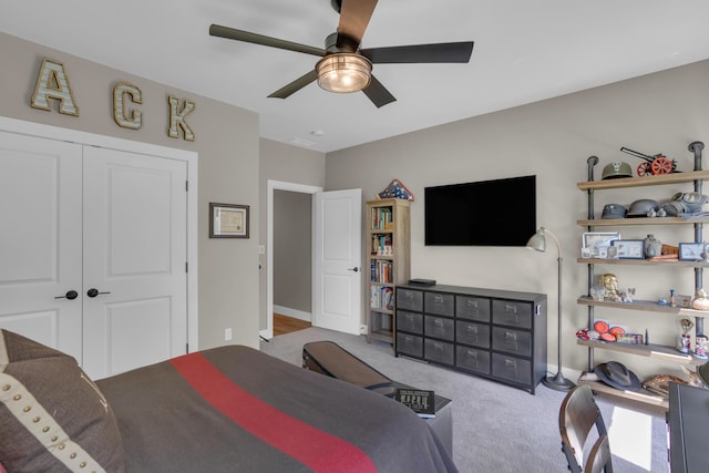 7501 Kirby Knowle Ct, Columbia, MO 65203 - bedroom with carpet flooring, a ceiling fan, and a closet