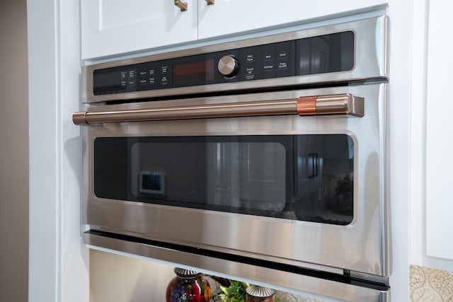7501 Kirby Knowle Ct, Columbia, MO 65203 - kitchen view of stainless steel double oven and white cabinets