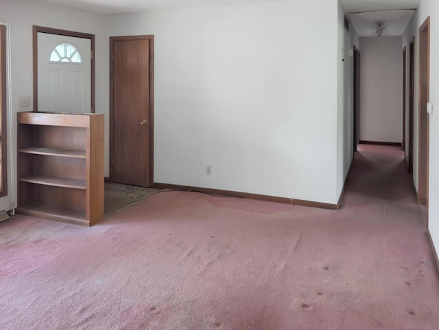 28 E Rosehill St, Marshall, MO 65340 - foyer featuring carpet floors and baseboards