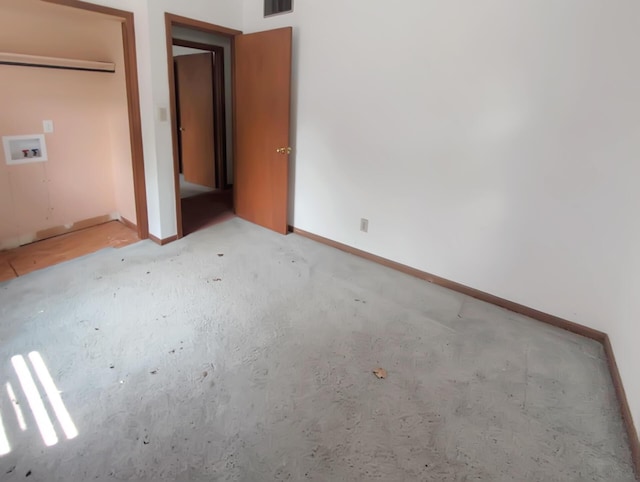 28 E Rosehill St, Marshall, MO 65340 - unfurnished bedroom with baseboards and carpet