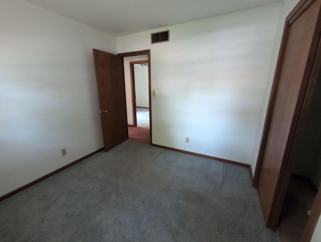 28 E Rosehill St, Marshall, MO 65340 - unfurnished bedroom with light carpet and baseboards