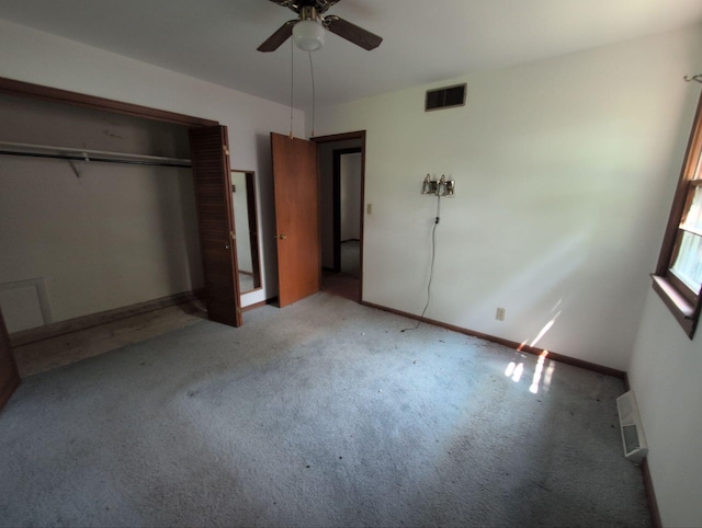 28 E Rosehill St, Marshall, MO 65340 - unfurnished bedroom with carpet flooring, baseboards, and ceiling fan
