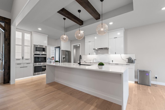 7305 Sella Ct, Columbia, MO 65203 - kitchen with a sink, appliances with stainless steel finishes, decorative backsplash, modern cabinets, and recessed lighting