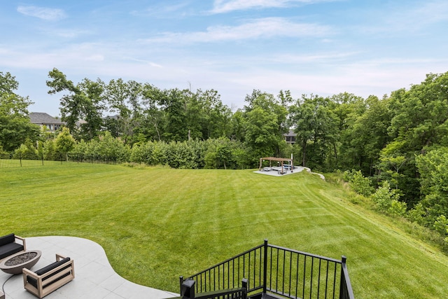7305 Sella Ct, Columbia, MO 65203 - view of green lawn featuring an outdoor fire pit