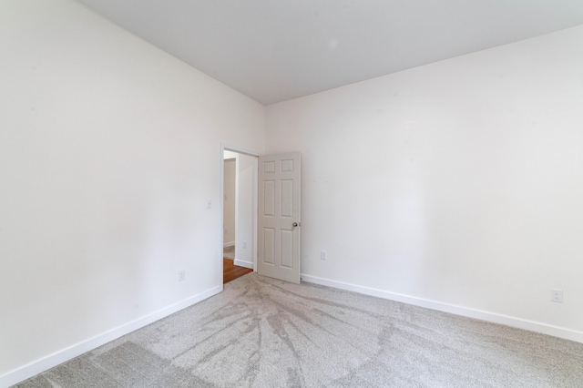 210 Oaklawn Ave, Fayette, MO 65248 - carpeted empty room featuring baseboards
