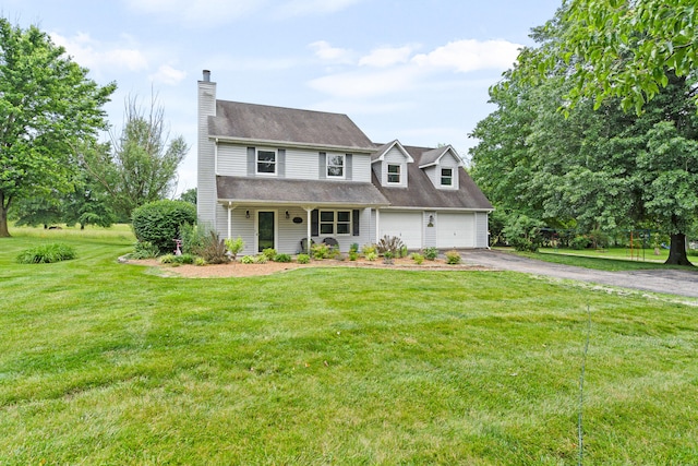 5700 Wilhite Rd, Columbia, MO 65202 - view of front of property featuring asphalt driveway, a chimney, a front yard, and a garage