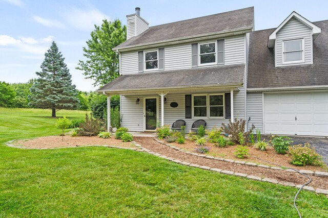5700 Wilhite Rd, Columbia, MO 65202 - view of front of house featuring a front lawn, a porch, and a chimney