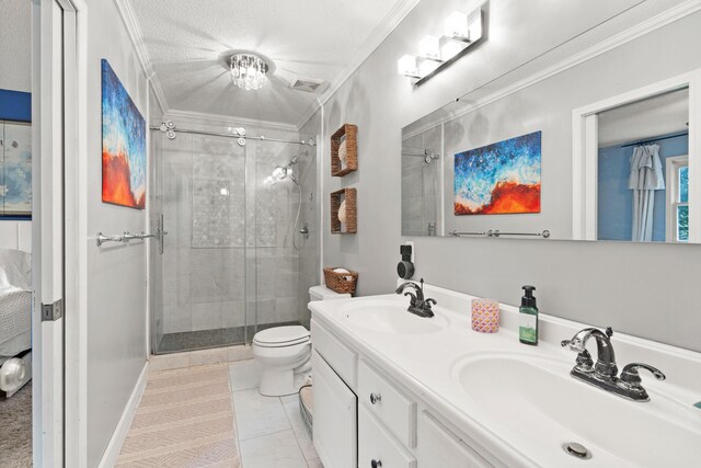 5700 Wilhite Rd, Columbia, MO 65202 - bathroom featuring ornamental molding, a stall shower, toilet, double vanity, and tile patterned flooring