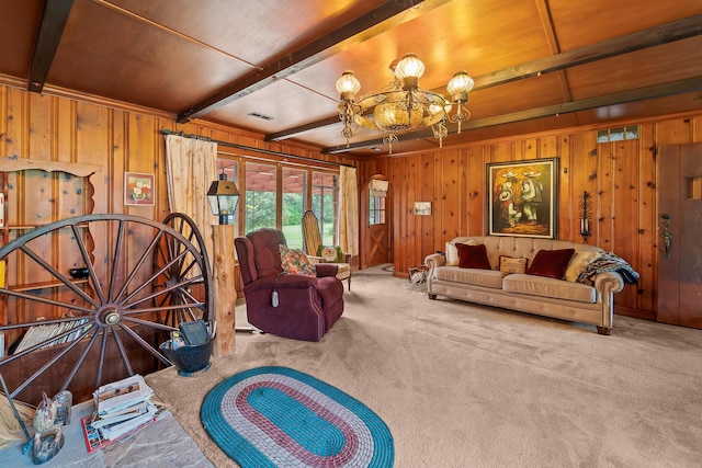 304 W Maple St, Auxvasse, MO 65231 - carpeted living area with wooden walls, a chandelier, and beam ceiling