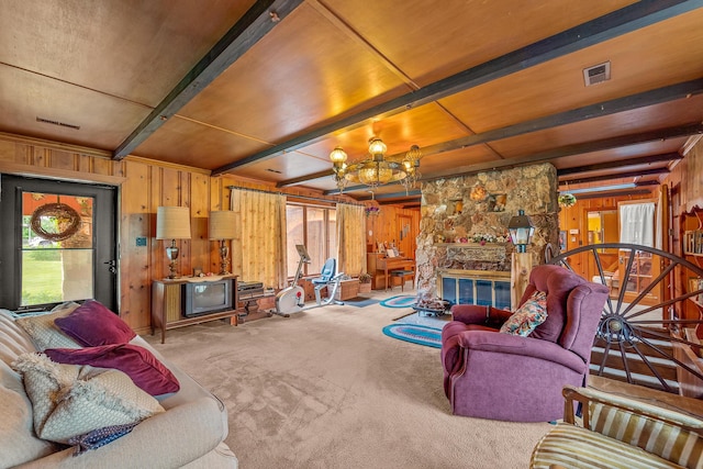 304 W Maple St, Auxvasse, MO 65231 - carpeted living area featuring wooden walls, a chandelier, and wooden ceiling with exposed beams