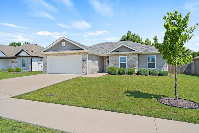 5817 Geyser Blvd, Columbia, MO 65202 - ranch-style house with stone siding, a garage, driveway, and a front lawn