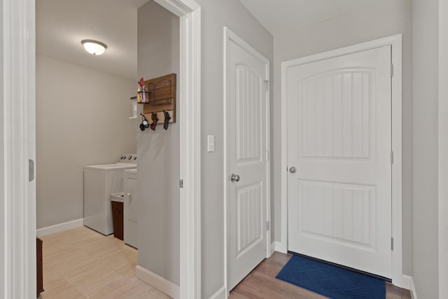 5817 Geyser Blvd, Columbia, MO 65202 - laundry area with separate washer and dryer and baseboards