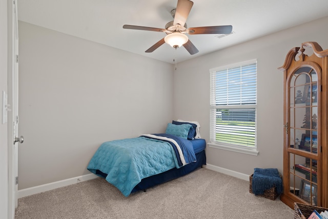 5817 Geyser Blvd, Columbia, MO 65202 - carpeted bedroom featuring baseboards and a ceiling fan