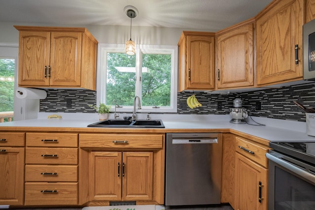 10060 E David Allen Rd, Columbia, MO 65201 - kitchen featuring stainless steel appliances, a sink, tasteful backsplash, and light countertops