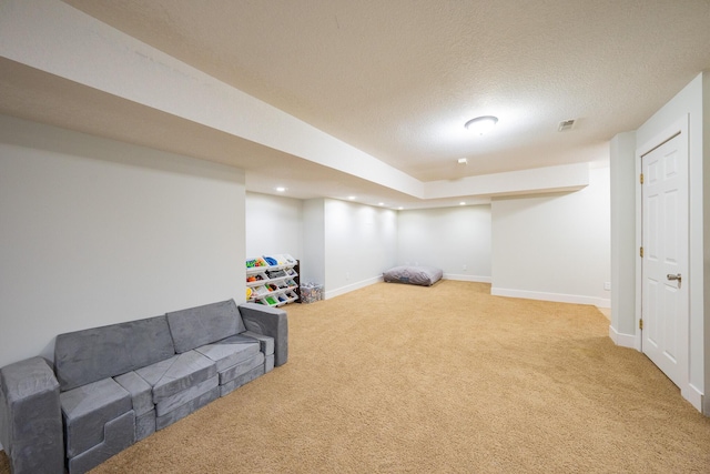 10060 E David Allen Rd, Columbia, MO 65201 - carpeted living area with baseboards, a textured ceiling, and recessed lighting