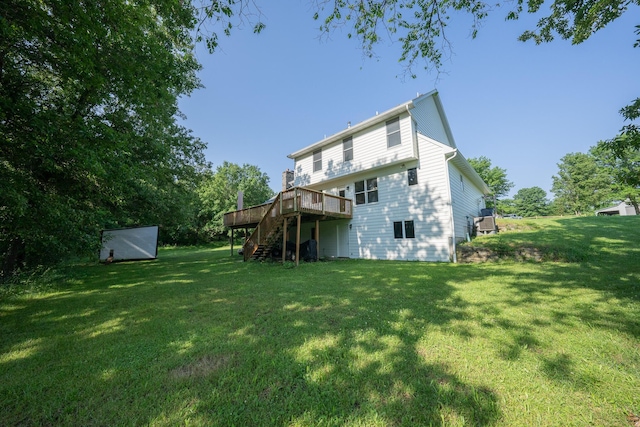 10060 E David Allen Rd, Columbia, MO 65201 - back of property featuring a wooden deck, stairs, and a yard