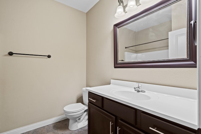 4008 W Worley St Unit 301, Columbia, MO 65203 - bathroom featuring baseboards and vanity