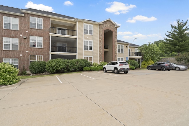 4008 W Worley St Unit 301, Columbia, MO 65203 - view of property featuring uncovered parking