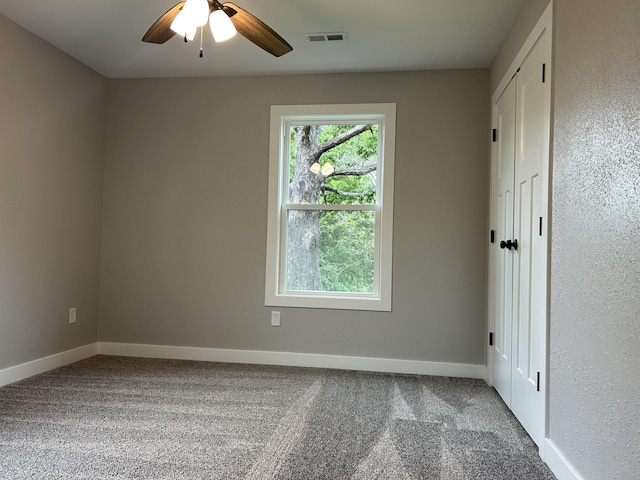 915 Colorado St, Jefferson City, MO 65109 - unfurnished room featuring ceiling fan, carpet, and baseboards