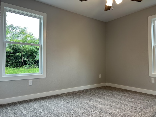 915 Colorado St, Jefferson City, MO 65109 - carpeted empty room with a ceiling fan and baseboards
