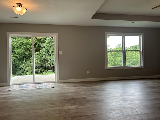 915 Colorado St, Jefferson City, MO 65109 - spare room featuring healthy amount of natural light, baseboards, and wood finished floors