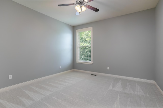2016 Devonshire Dr, Columbia, MO 65203 - empty room with light carpet and a ceiling fan