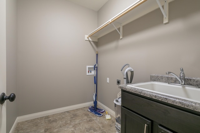 2016 Devonshire Dr, Columbia, MO 65203 - laundry room featuring electric dryer hookup, cabinet space, and hookup for a washing machine
