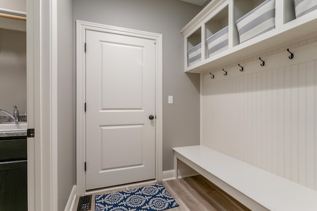 2016 Devonshire Dr, Columbia, MO 65203 - mudroom featuring light wood finished floors and a sink