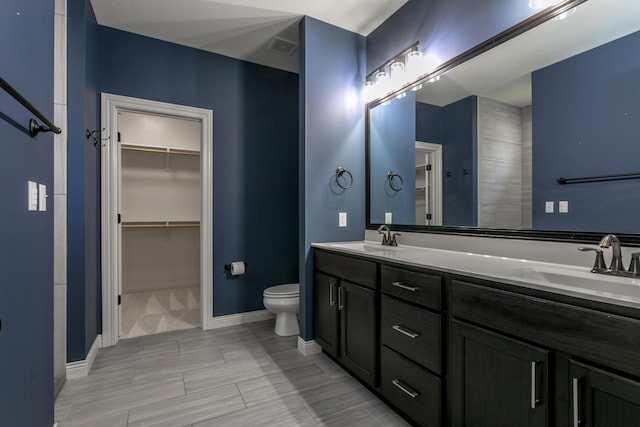 2016 Devonshire Dr, Columbia, MO 65203 - full bath with double vanity and a walk in closet