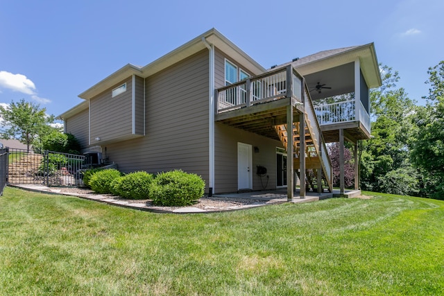 2016 Devonshire Dr, Columbia, MO 65203 - rear view of house with a ceiling fan, a deck, and a patio