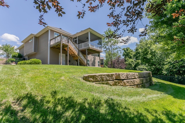 2016 Devonshire Dr, Columbia, MO 65203 - back of house featuring a ceiling fan, stairs, and a deck