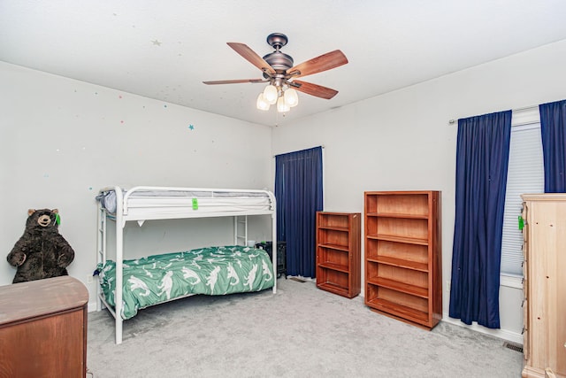 8801 S Ginn Ln, Columbia, MO 65201 - bedroom featuring carpet floors and ceiling fan