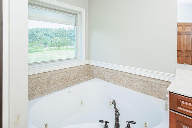 8801 S Ginn Ln, Columbia, MO 65201 - full bath featuring a tub with jets and vanity