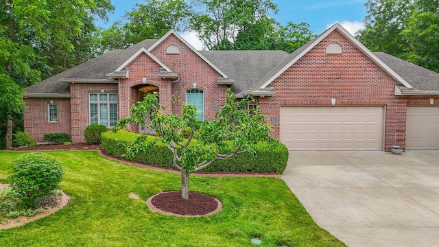 203 Foxwood Ct, Columbia, MO 65203 - traditional home featuring roof with shingles, brick siding, driveway, and a garage