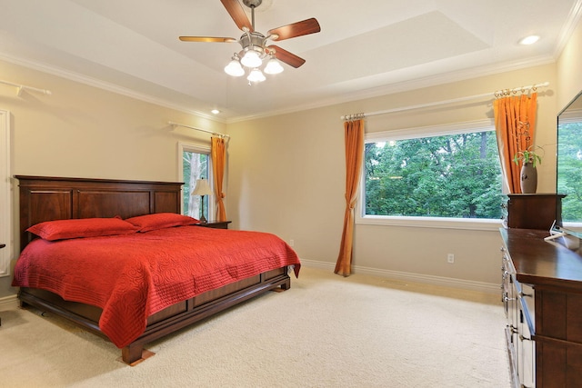 203 Foxwood Ct, Columbia, MO 65203 - bedroom with crown molding, light colored carpet, a raised ceiling, a ceiling fan, and recessed lighting