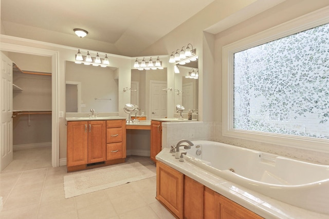203 Foxwood Ct, Columbia, MO 65203 - full bath with vanity, a tub with jets, and tile patterned flooring