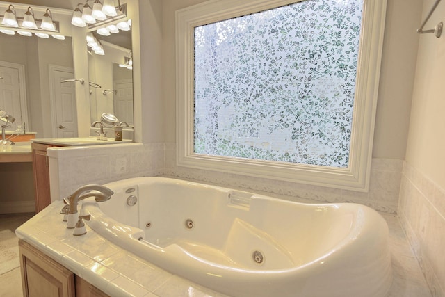 203 Foxwood Ct, Columbia, MO 65203 - full bathroom featuring a whirlpool tub and a sink