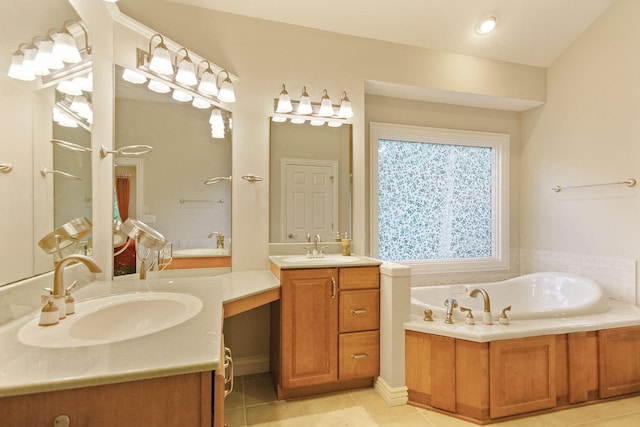 203 Foxwood Ct, Columbia, MO 65203 - bathroom featuring two vanities, tile patterned floors, and a garden tub