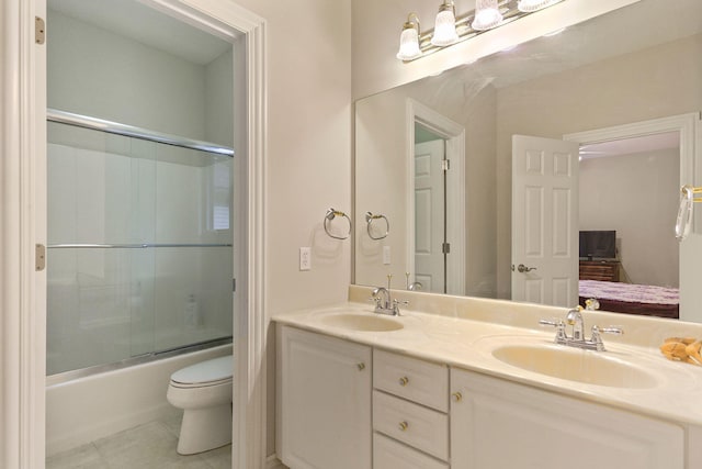 203 Foxwood Ct, Columbia, MO 65203 - full bath featuring double vanity, shower / bath combination with glass door, and tile patterned floors